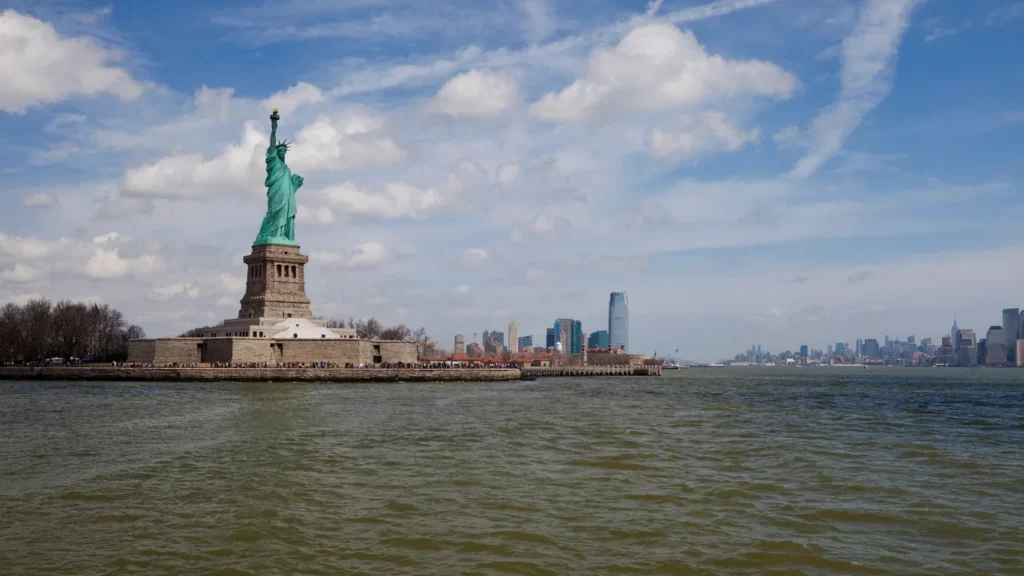 Statue of Liberty and Ellis Island, CheapTravelASAP, Top 5 Must-Visit NYC Attractions for 2025, cheaptravelasap